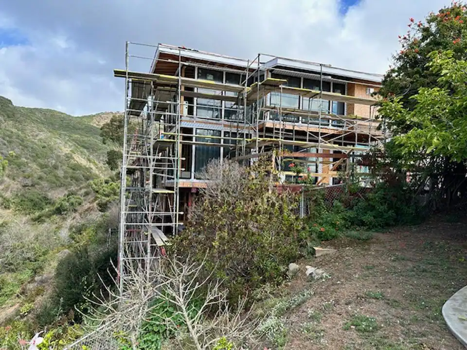Hillside home scaffolding setup by Hayward Scaffolding Rental for exterior renovations